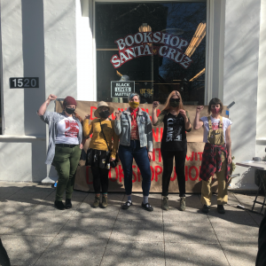 Bookshop Santa Cruz Workers in front of the storefront